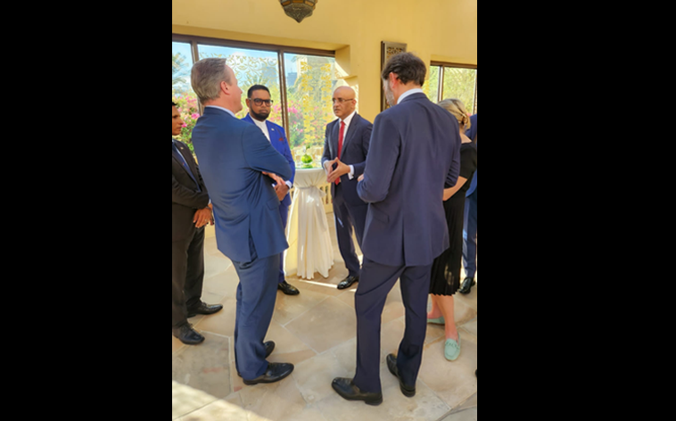 Foreign Minister of United Kingdom David Cameron talking to President Dr. Irfaan Ali and Vice President Dr. Bharrat Jagdeo.