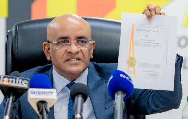 Dr. Bharrat Jagdeo’s Last Thursday press conference highlighted the need to extradite Azruddin and Nazar Mohamed to the U.S. for serious international money laundering charges, as sanctioned and approved by Secretary of State Marco Rubio and Attorney General Pam Bondi. Vice President Dr. Bharrat Jagdeo Holding Extradition papers for Nazar Mohamed and Azaruddin Mohamed from USA authorities