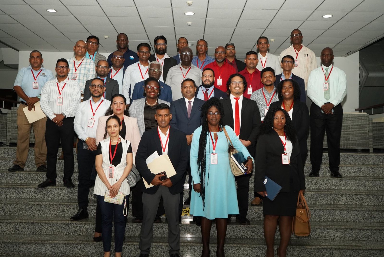 Minister of Public Utilities and Aviation , Deodat Indar with the Team