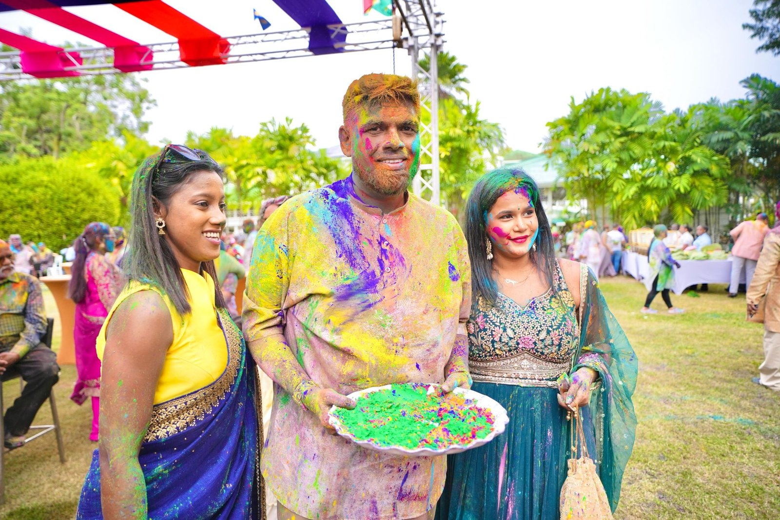 President Dr. Irfaan Ali playing Holi with the Guyanese Peoples