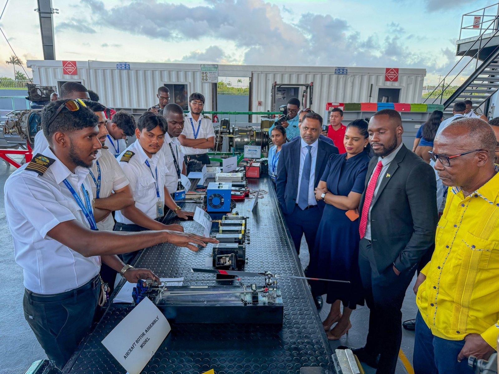 Minister of Utilities and Aviation Deodat Indar with other officials 