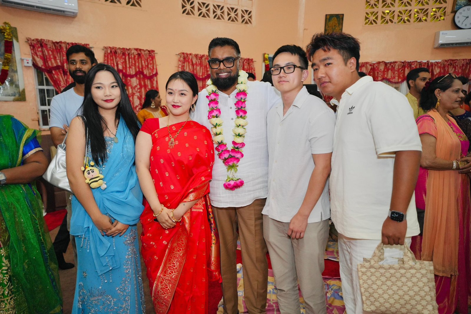 President Dr Irfaan Ali and devotees at Alexander Temple