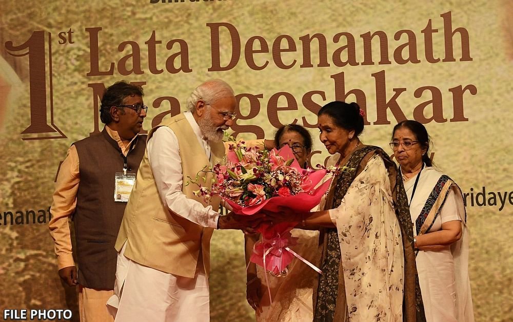 Legendary playback singer Asha Bhosle with PM Narendra Modi
