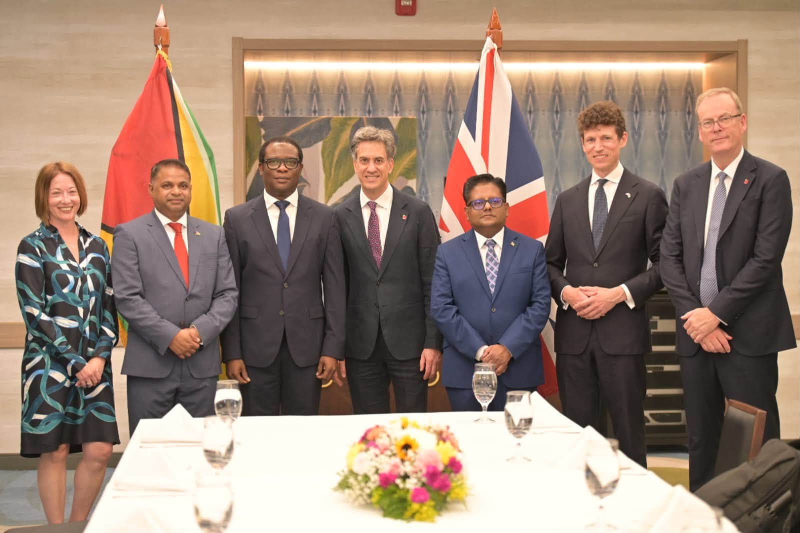 Minister of Public Utilities and Aviation Deodat Indar, Ashni Singh, and Ed Miliband
